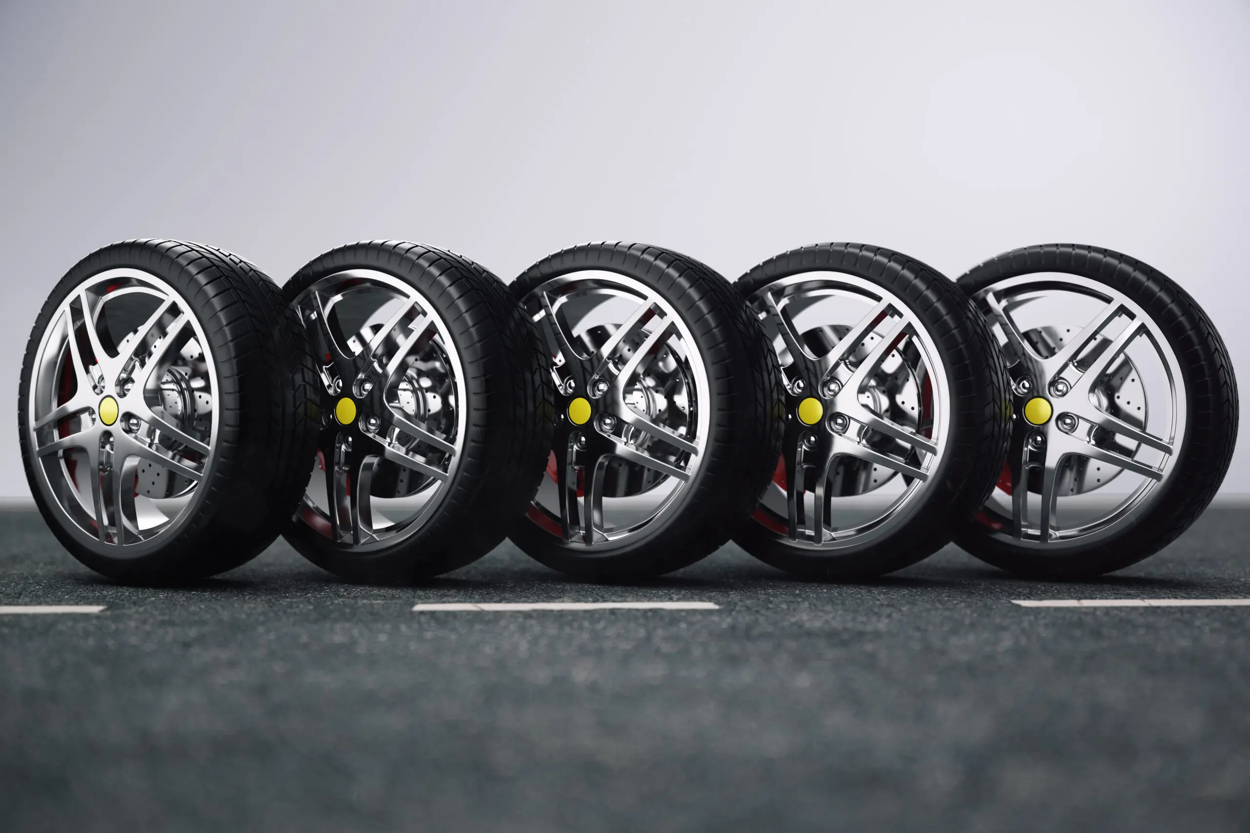 Car wheel, car tire standing on a road. Concept tyres. Car tire with a disc standing on the asphalt road, 3D illustration